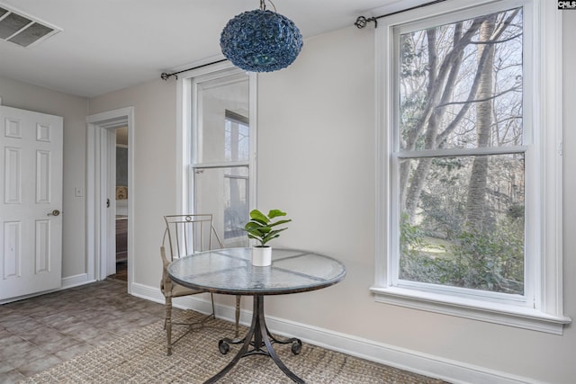 dining room with plenty of natural light