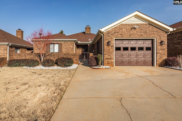 view of front of home with a garage