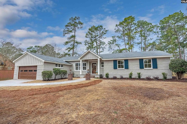 ranch-style house featuring brick siding, board and batten siding, fence, a garage, and driveway