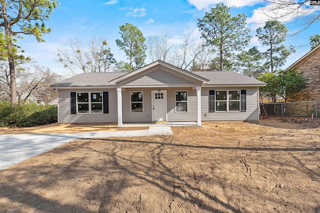 ranch-style home with a porch