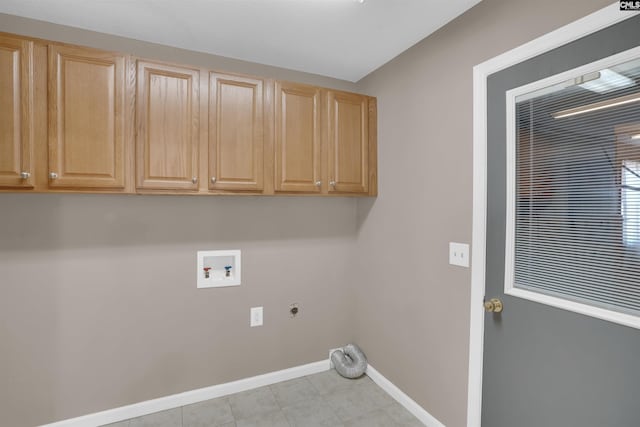 clothes washing area with hookup for a washing machine, hookup for an electric dryer, and cabinets