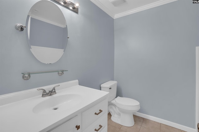 bathroom with ornamental molding, vanity, toilet, and tile patterned flooring