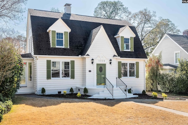 view of front of house with a front lawn