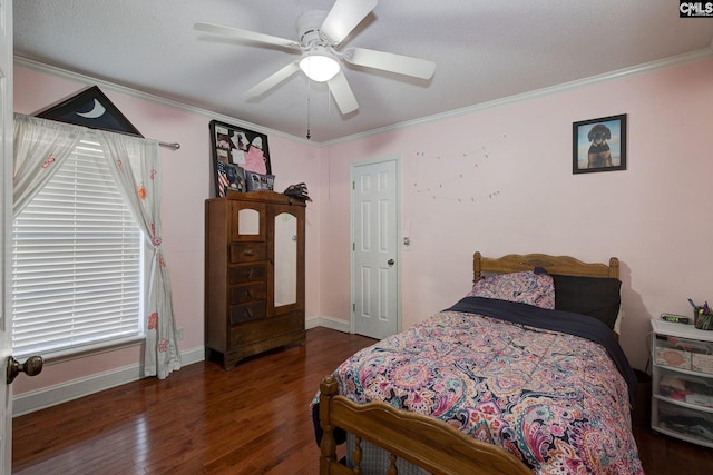 bedroom featuring crown molding, ceiling fan, and dark hardwood / wood-style flooring