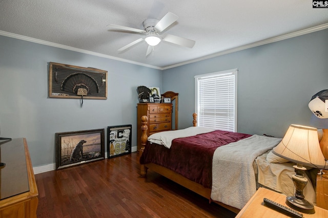 bedroom featuring ornamental molding, dark hardwood / wood-style floors, and ceiling fan