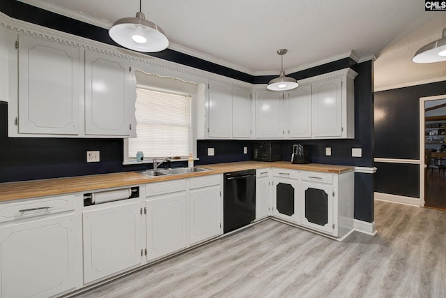 kitchen featuring pendant lighting, sink, crown molding, dishwasher, and white cabinetry