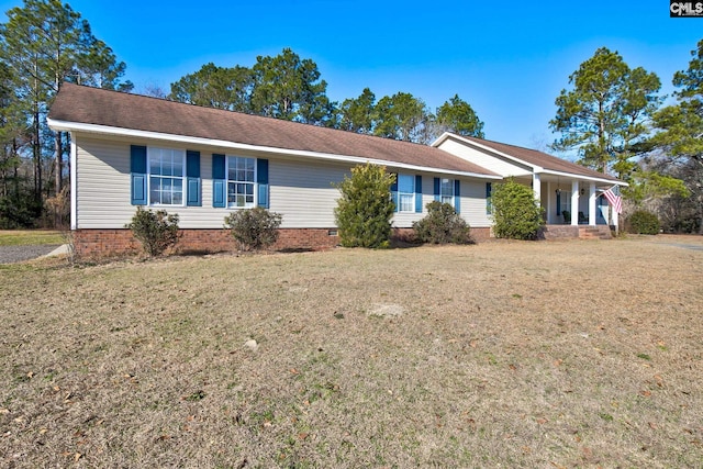 single story home with a porch and a front yard