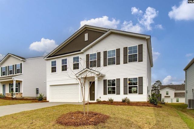 view of front of house with a garage, central AC, and a front lawn