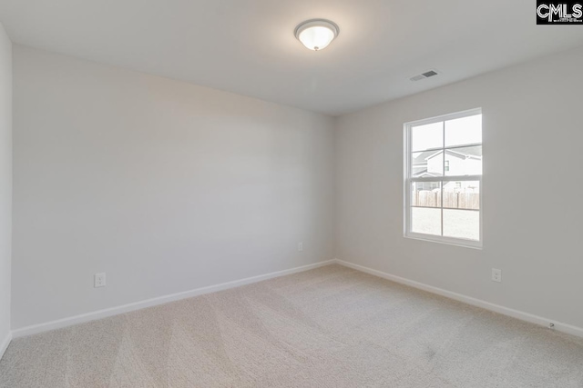 view of carpeted spare room