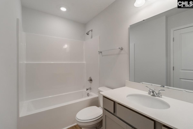 full bathroom featuring vanity, shower / bathtub combination, and toilet