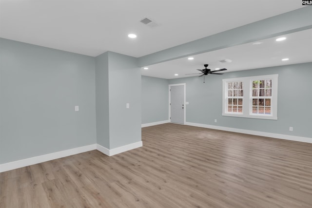 unfurnished room featuring ceiling fan and light hardwood / wood-style flooring