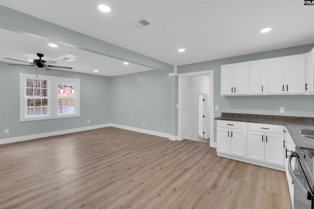 kitchen featuring ceiling fan, dishwasher, white cabinets, and light wood-type flooring