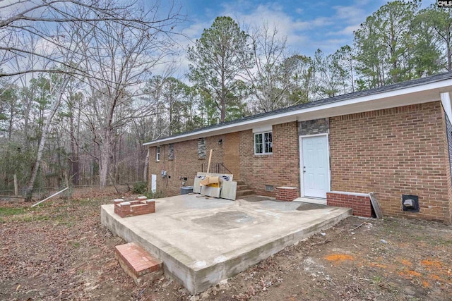 rear view of property with a patio area