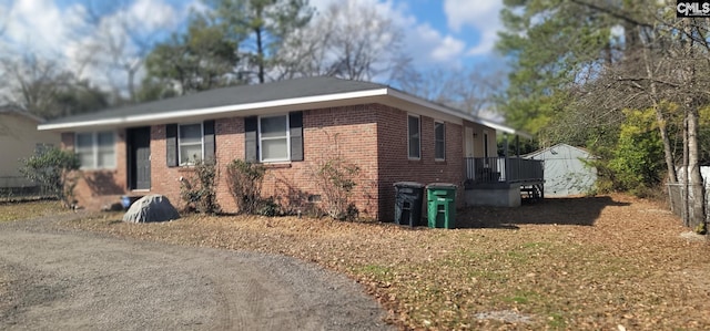 view of front of property featuring brick siding