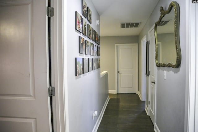 hall with dark hardwood / wood-style floors