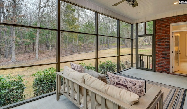 sunroom / solarium with ceiling fan