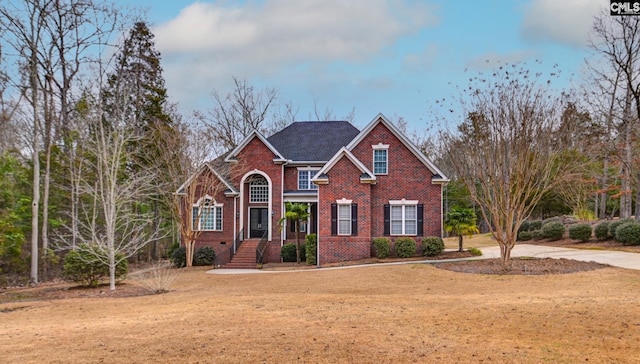 view of front facade with a front yard