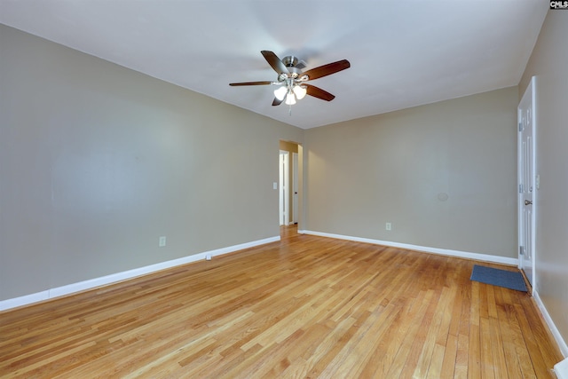 unfurnished room featuring ceiling fan and light wood-type flooring