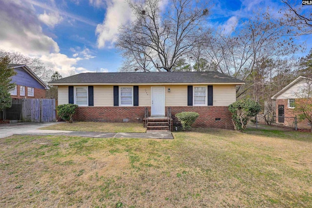 ranch-style home with a front lawn