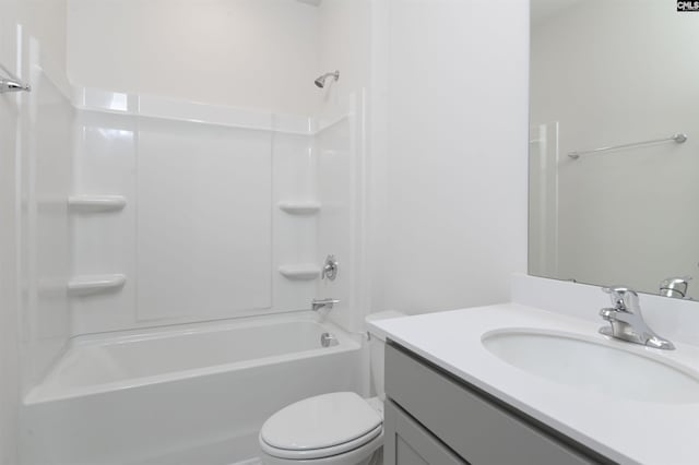 full bathroom with vanity, shower / tub combination, and toilet