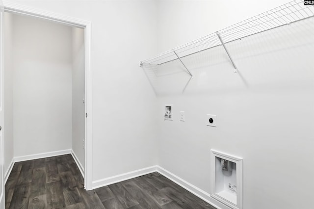 clothes washing area with electric dryer hookup, hookup for a washing machine, and dark wood-type flooring