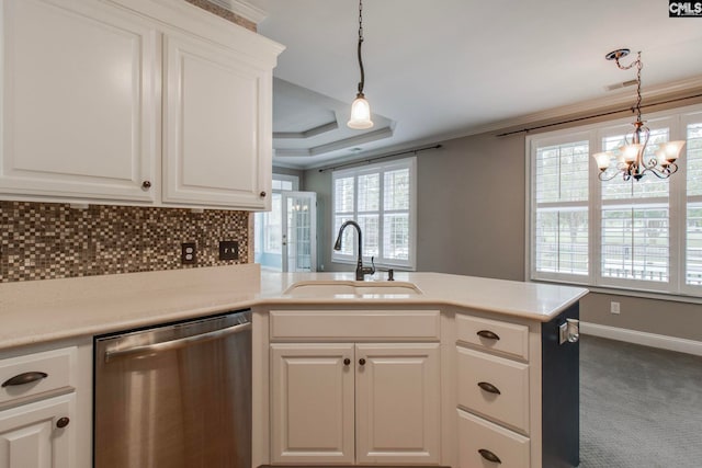 kitchen with white cabinetry, carpet floors, dishwasher, and sink