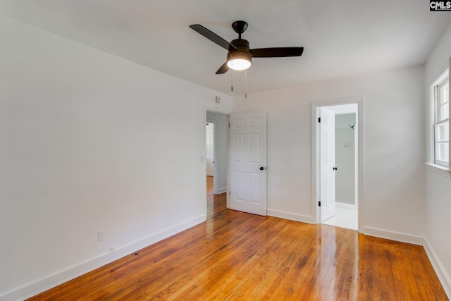 unfurnished bedroom featuring light hardwood / wood-style flooring and ceiling fan