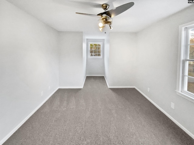 empty room featuring carpet and ceiling fan