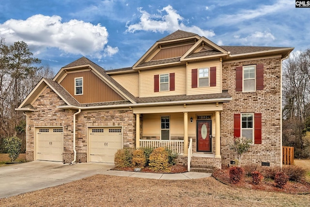 craftsman house with a garage and a porch