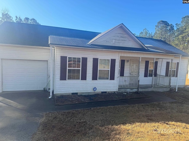 view of front facade with a garage, a front lawn, and a porch