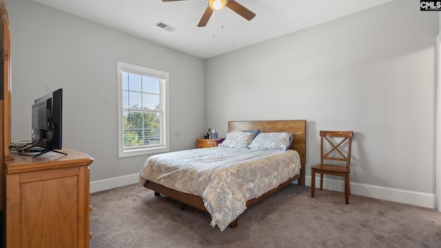 bedroom with light carpet and ceiling fan