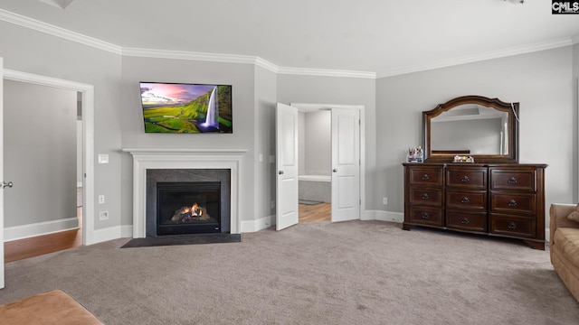 carpeted living room with crown molding