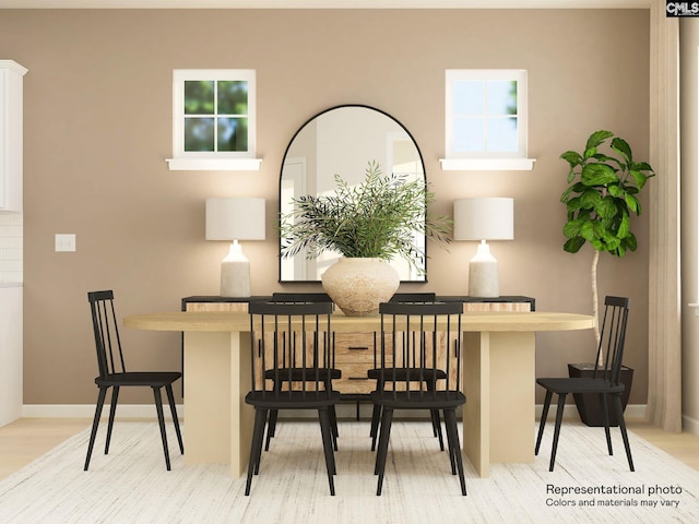 dining space featuring light hardwood / wood-style floors