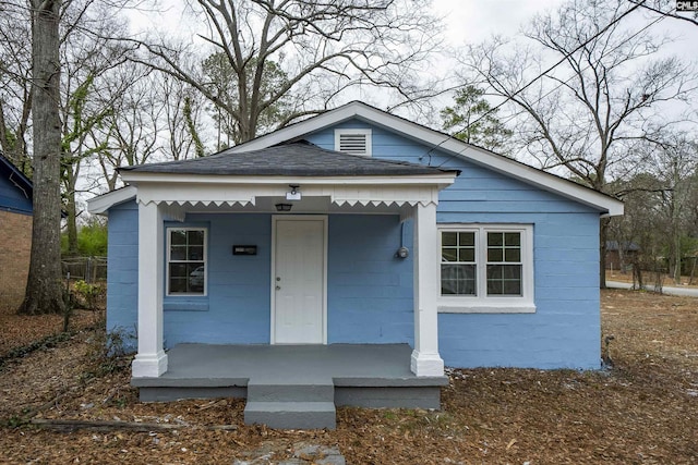 bungalow-style house featuring covered porch