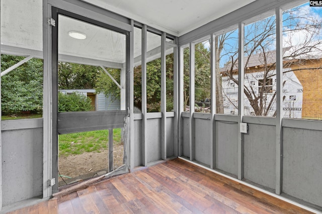 unfurnished sunroom featuring a healthy amount of sunlight