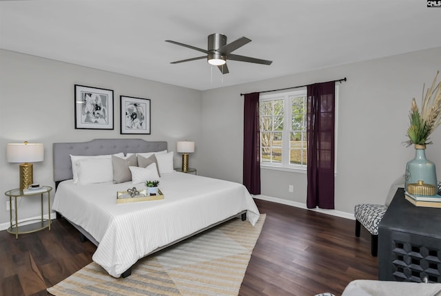 bedroom featuring dark wood-type flooring and ceiling fan