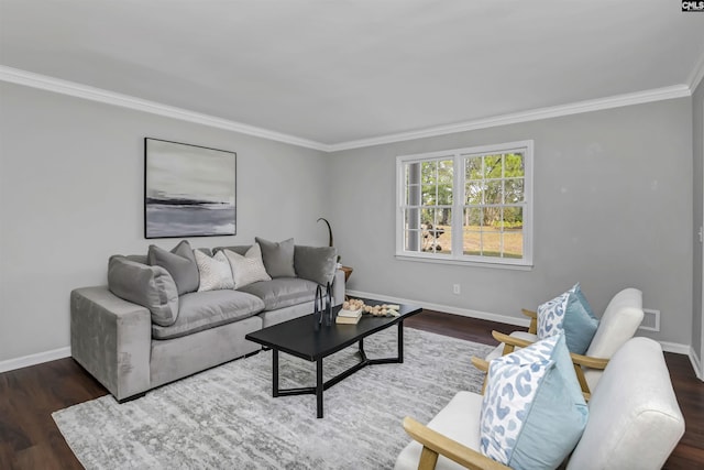 living room with dark hardwood / wood-style flooring and crown molding