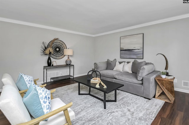 living room with hardwood / wood-style flooring and crown molding