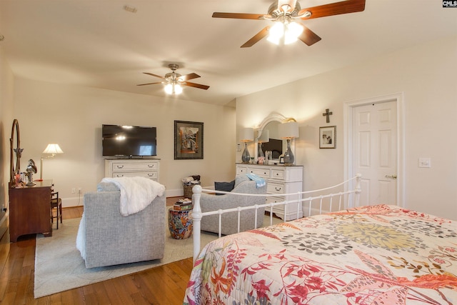 bedroom featuring hardwood / wood-style flooring and ceiling fan