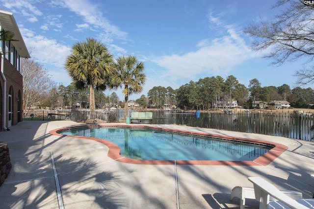 view of pool featuring a water view