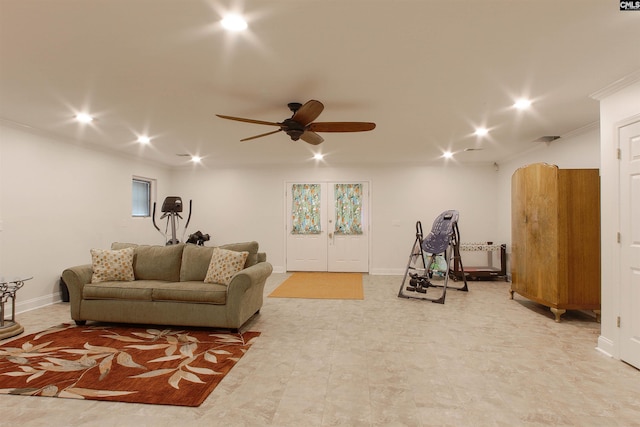 living room with ornamental molding, ceiling fan, and french doors