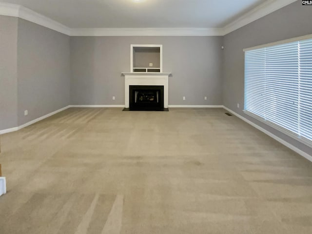 unfurnished living room with crown molding and light colored carpet