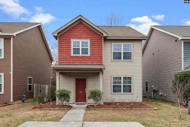 view of front of home featuring a front yard