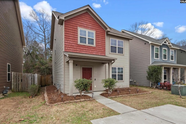 view of front of property featuring a front yard