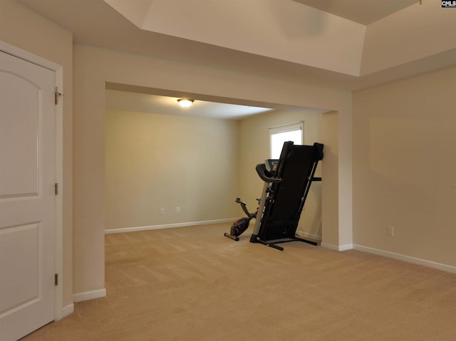 exercise room with light carpet