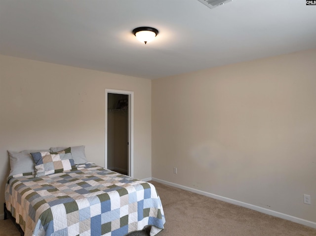 bedroom with light carpet