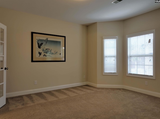 view of carpeted spare room