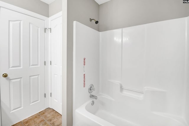 bathroom with  shower combination and tile patterned flooring