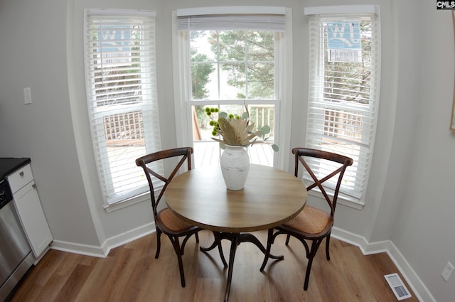 dining room featuring light hardwood / wood-style floors