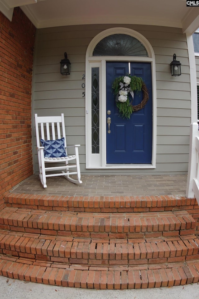 property entrance with a porch